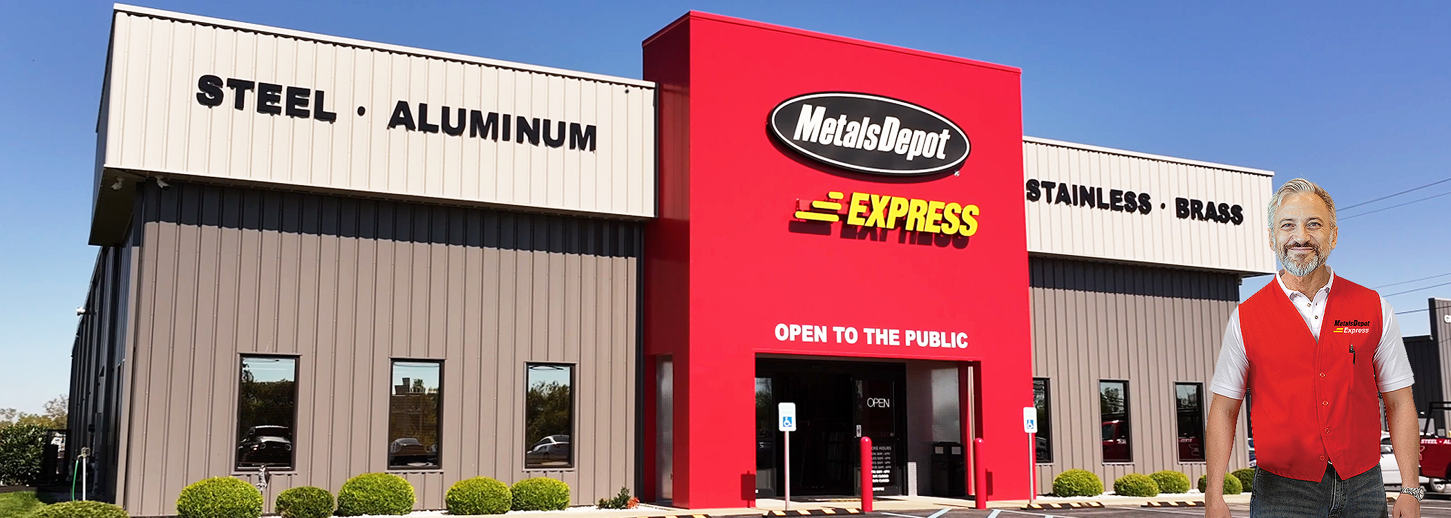 Building with Metals Depot Express sign, red Open to the Public entrance, man in red vest.